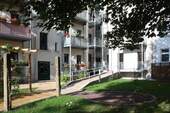Hinterhof - Moderne 2-Zimmerwohnung mit Balkon und Barrierefreiheit in Mockau-Süd