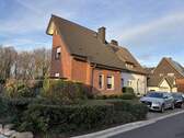 Seitenansicht - 8 Zimmer Mehrfamilienhaus, Wohnhaus zum Kaufen in Ennigerloh