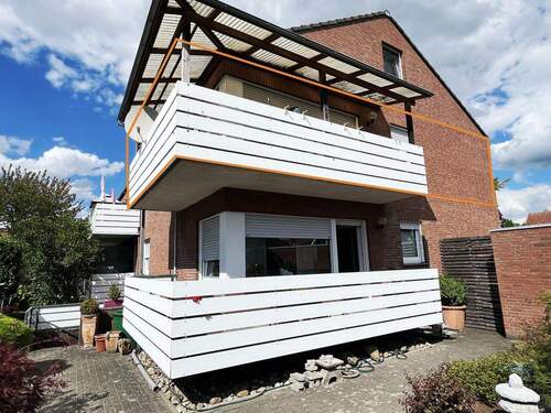 Rückansicht mit Balkon - OG - Etagenwohnung mit 71,60 m&sup2; in Greven zum Kaufen