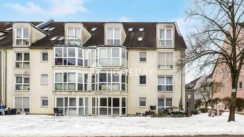 Außenansicht 1 - Attraktive Erdgeschosswohnung in gepflegtem Mehrfamilienhaus mit TG-Stellplatz