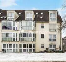 Attraktive Erdgeschosswohnung in gepflegtem Mehrfamilienhaus mit TG-Stellplatz - Nittendorf