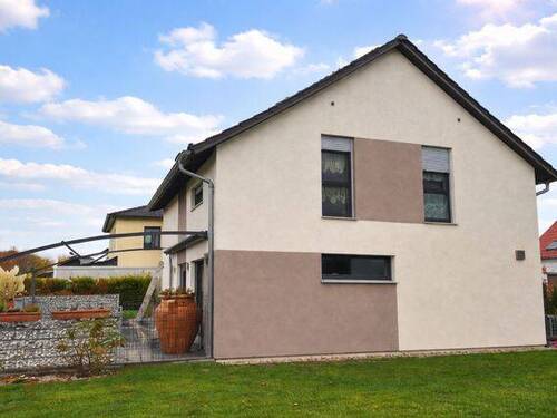 Blick auf die Terrasse - 4 Zimmer Einfamilienhaus zum Kaufen in Leipzig