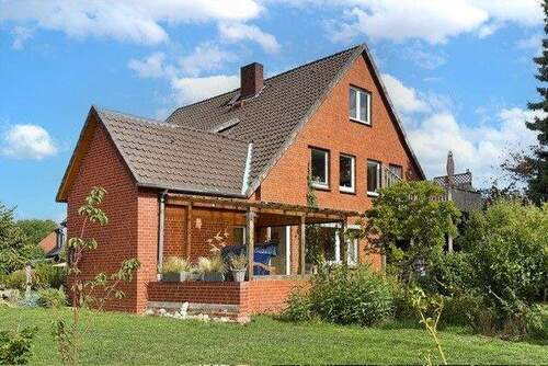 Gartenseite - 8 Zimmer Einfamilienhaus zum Kaufen in Marklohe