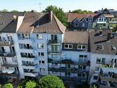 Rückseite mit Balkon - 2 Zimmer Etagenwohnung in Essen