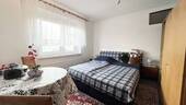 Vielseitig nutzbares Zimmer im Obergeschoss - 
