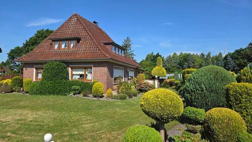 Blick aus dem Garten - Einfamilienhaus mit 184,00 m² in Apen zum Kaufen