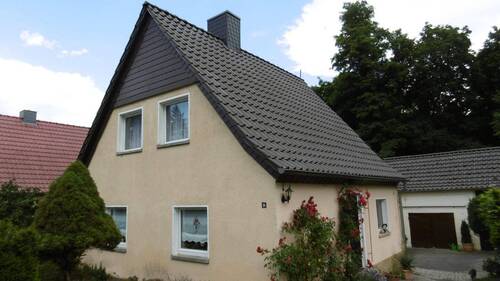 Vorderansicht mit Seitenansich - Einfamilienhaus mit 130,00 m² in Lutherstadt Wittenberg zum Kaufen