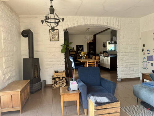 Wohnzimmer mit Kaminofen - 5 Zimmer Einfamilienhaus in Zemmer / Schleidweiler