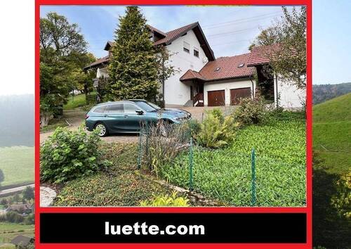 Aussenansicht - freist. 3-FamH., Areal ca. 1.000 m², 2 Garagen, gepflegter Allgemeinzustand