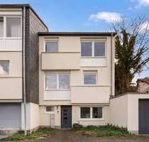 Familienglück in Metzkausen: modernisiertes Reihenendhaus mit Garten & Ausbaupotenzial - Mettmann