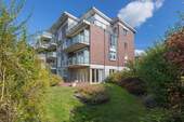 Hausansicht WHG Erdgeschoss - Großzügige 4-Zimmer-Erdgeschosswohnung mit Terrasse und TG-Stellplatz in ruhiger Lage von Rendsburg