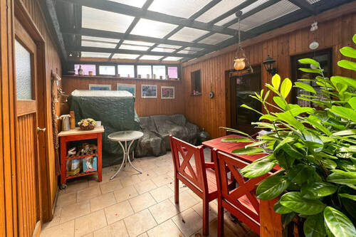Überdachte Terrasse hinter dem Haus_ - 