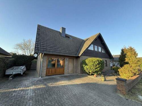 Bild 1 - Dörverden - Hülsen: Solide gemauertes und familientaugliches Zuhause mit Wintergarten und Kaminofen