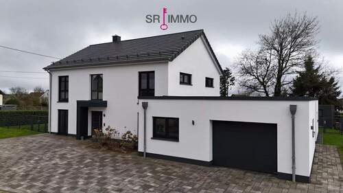 Bild 2 - 6 Zimmer Einfamilienhaus zum Kaufen in Koxhausen