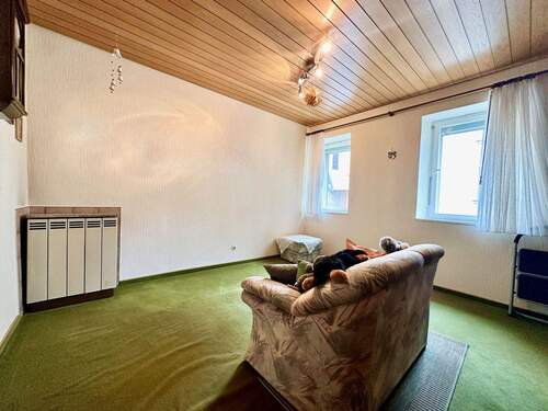 Wohnzimmer - Einfamilienhaus mit 104,00 m&sup2; in Werneck zum Kaufen