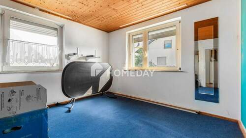 1. OG Schlafzimmer 1 - 