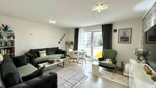 Wohnzimmer - Moderne Eigentumswohnung mit Tageslichtbad und Stellplatz in Maintal-Bischofsheim