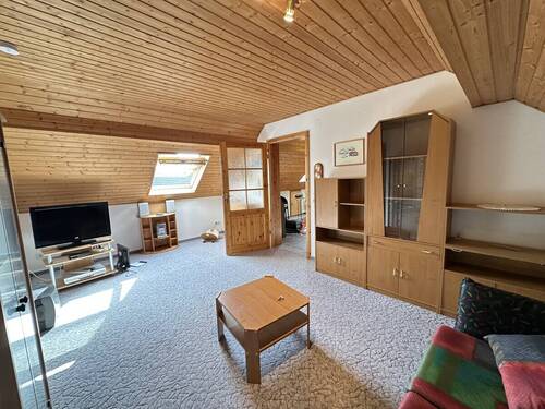 DAchgeschoss Wohnzimmer - 