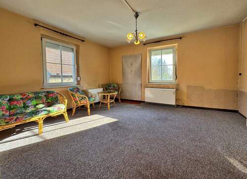 Helles Wohnzimmer im EG - Einfamilienhaus mit 87,80 m&sup2; in Käbschütztal / Krögis zum Kaufen