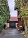 linke Hausseite mit Garage - 