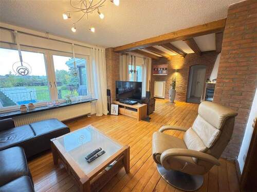 Wohnzimmer mit Blick auf die Terrasse & Garten - 