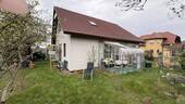 Blick aufs Haus mit Wintergarten - Einfamilienhaus mit 120,00 m&sup2; in Weißwasser zum Kaufen