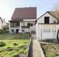 Zweifamilienhaus mit Ausbaupotenzial in ruhiger Ortsrandlage von Altrip