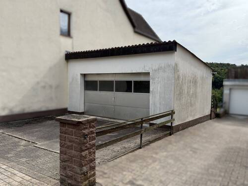 Garage - Doppelhaushälfte mit 167,00 m² in Derental zum Kaufen