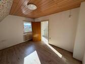 Zimmer im Dachgeschoss - 