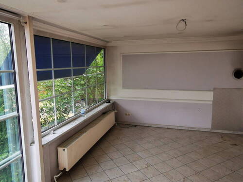 Wohnzimmer EG mit Kaminanschl. - 