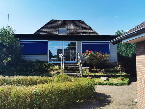 Hausansicht Gartenseite - 1 Zimmer Mehrfamilienhaus, Wohnhaus in Wedemark