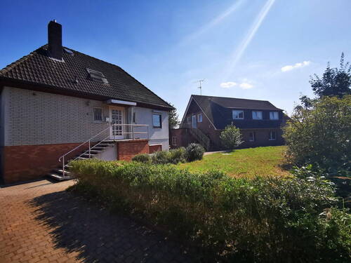 Vorderseite - Mehrfamilienhaus, Wohnhaus mit 295,00 m&sup2; in Wedemark zum Kaufen