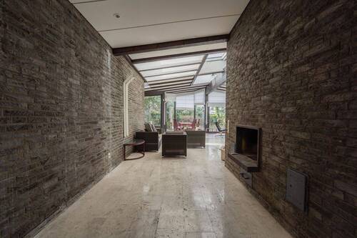 Wintergarten mit Kamin - 