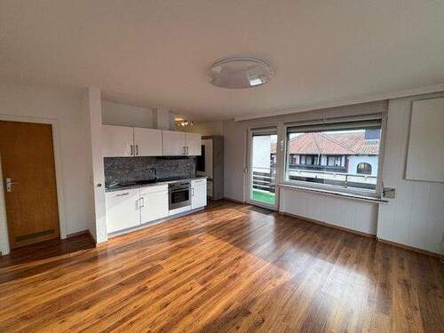 Wohnzimmer mit offener Küche - ***Mit Blick auf den Hausberg***