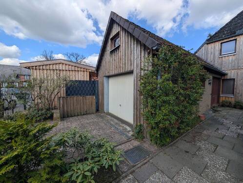 Garage - Mehrfamilienhaus, Wohnhaus mit 168,00 m&sup2; in Bergen zum Kaufen