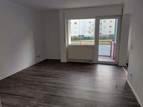 Wohnzimmer - Etagenwohnung mit 69,90 m&sup2; in Landau zum Kaufen