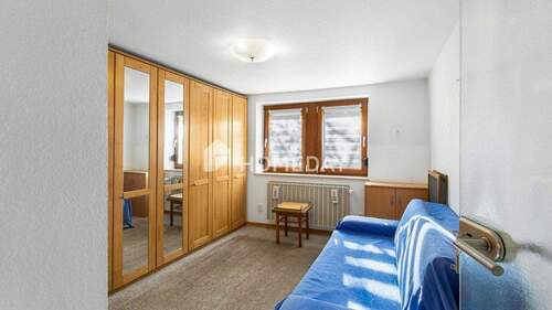 1. OG Schlafzimmer 1 - 