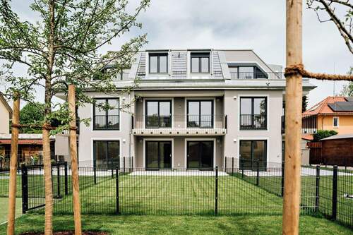Außenansicht - Helle, moderne Wohnung mit Garten: Leben Sie Ihren Traum!