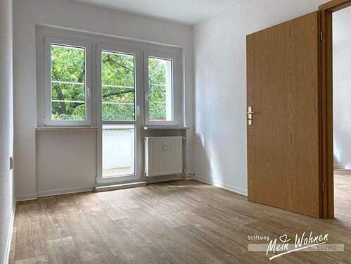 Schlafzimmer mit Balkon - 