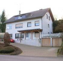 Wohnhaus mit drei Wohneinheiten und zwei Garagen Nähe Ruppichteroth