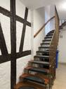 Treppe ins 1. Obergeschoss - 2 Zimmer Etagenwohnung zur Miete in Erlangen