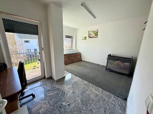 Schlafzimmer mit Balkon OG.jpeg - 