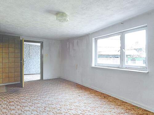 helles Wohnzimmer - Einfamilienhaus mit 115,60 m&sup2; in Ebsdorfergrund zum Kaufen