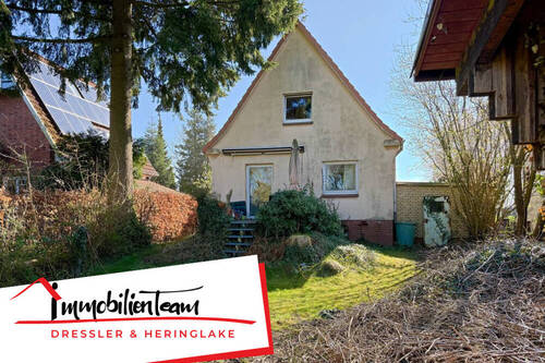Titelbild - Sanieren oder neu bauen? Kleines Einfamilienhaus auf 1.041 m² großem Grundstück in Halstenbek