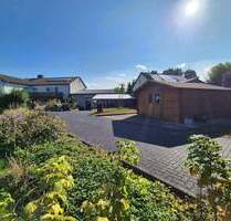 Einfamilienhaus mit viel Potenzial auf großem Grundstück in Calden