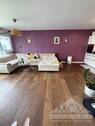 Wohnzimmer - Hochwertige 2-Zimmer-Neubauwohnung mit Panoramafenstern in ruhiger Lage in Offenbach