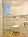 Duschbad mit WC im 1. Obergeschoss - 