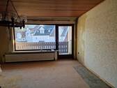 Wohnzimmer mit Balkon - 