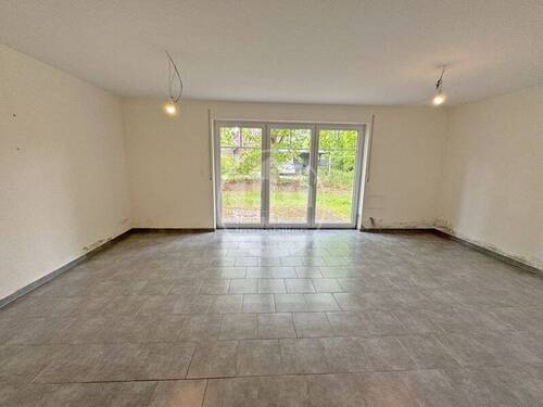 Wohnzimmer - 4 Zimmer Doppelhaushälfte zum Kaufen in Aurich / Walle