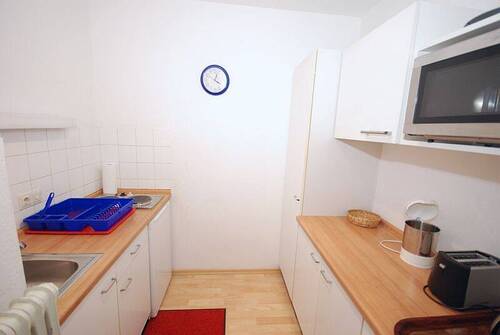 Küchenraum mit Einbauküche - 